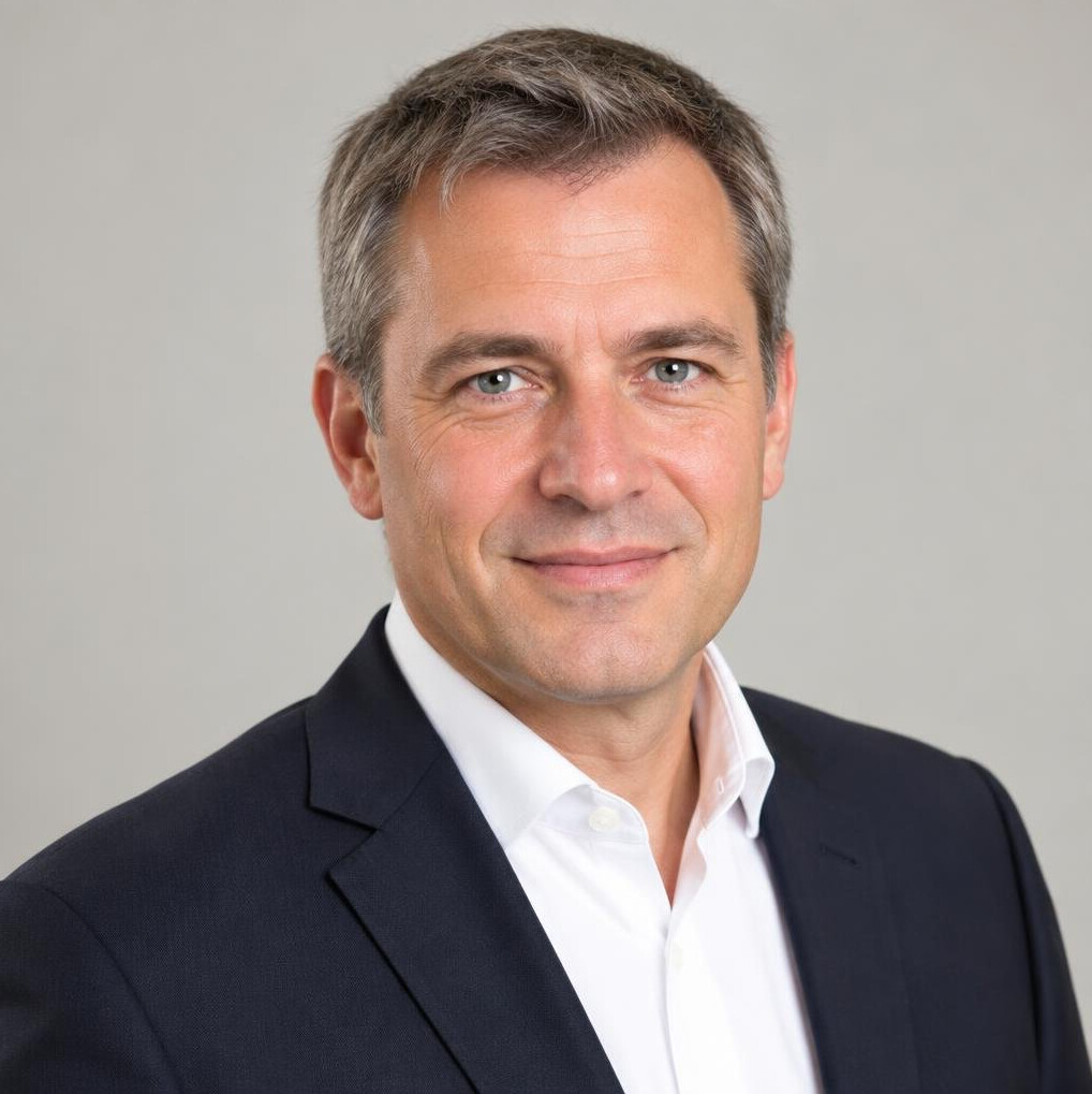Portrait of a businessman in a suit smiling
